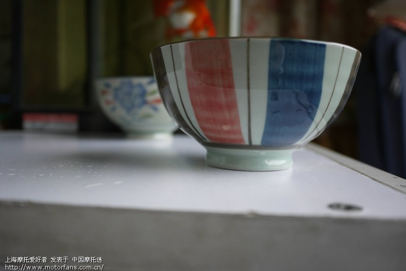 据说,松下GF2加饼干头 轻便且画质好 适合摩游