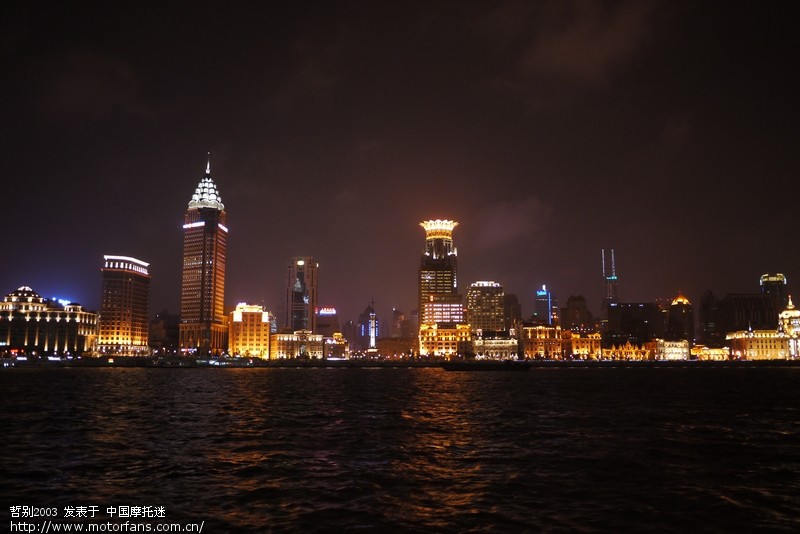 据说,松下GF2加饼干头 轻便且画质好 适合摩游