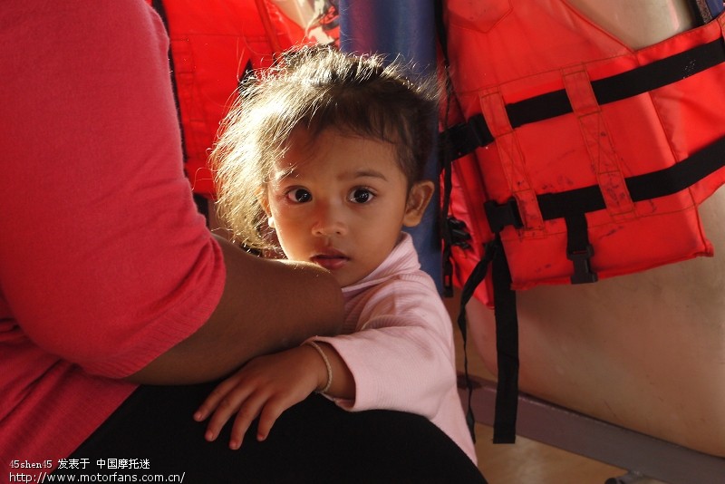 据说,松下GF2加饼干头 轻便且画质好 适合摩游