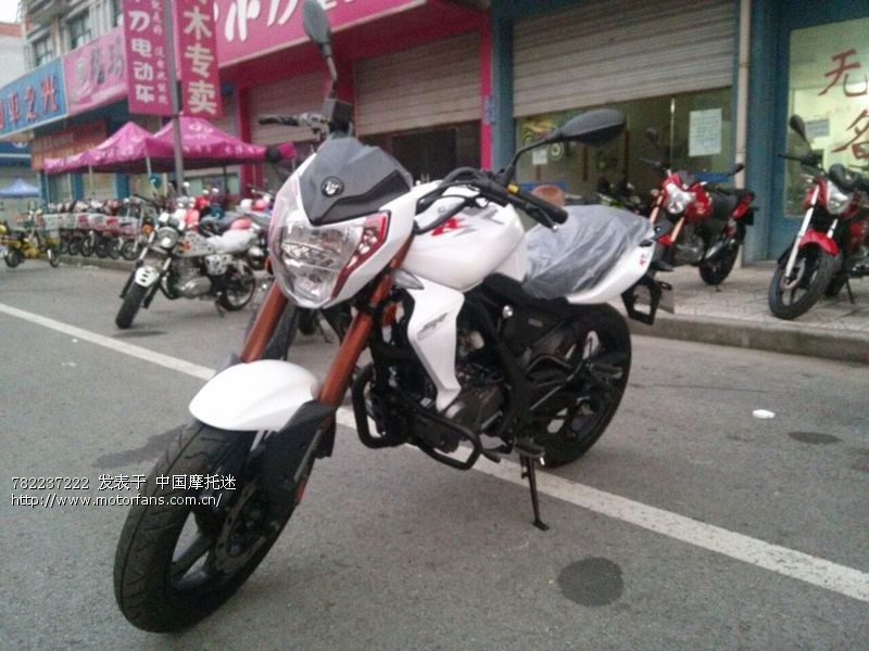 白色钱江蓝宝龙qj150 17a入手感受高清图片