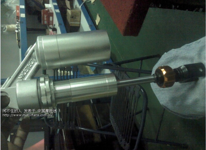 今天去一家摩托车减震维修设备看到的组装件 