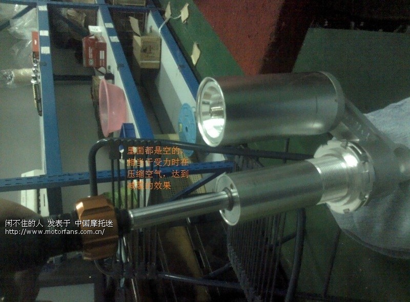 今天去一家摩托车减震维修设备看到的组装件 
