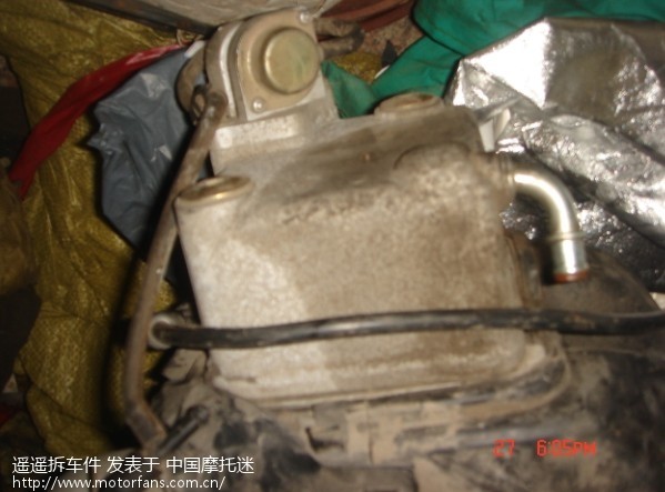 出一台铃木韵彩QS100发动机,带化油器充电器