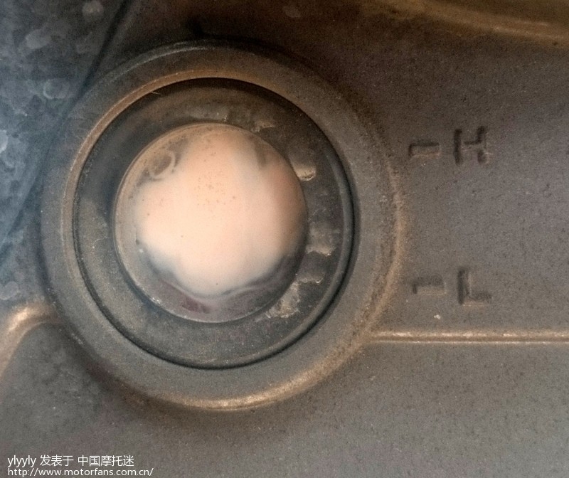 蓝宝龙150机油窗发黄求解 机油乳化?图片已补
