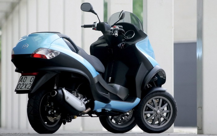 最近看到很多三轮踏板车(前面两轮子的那种) -